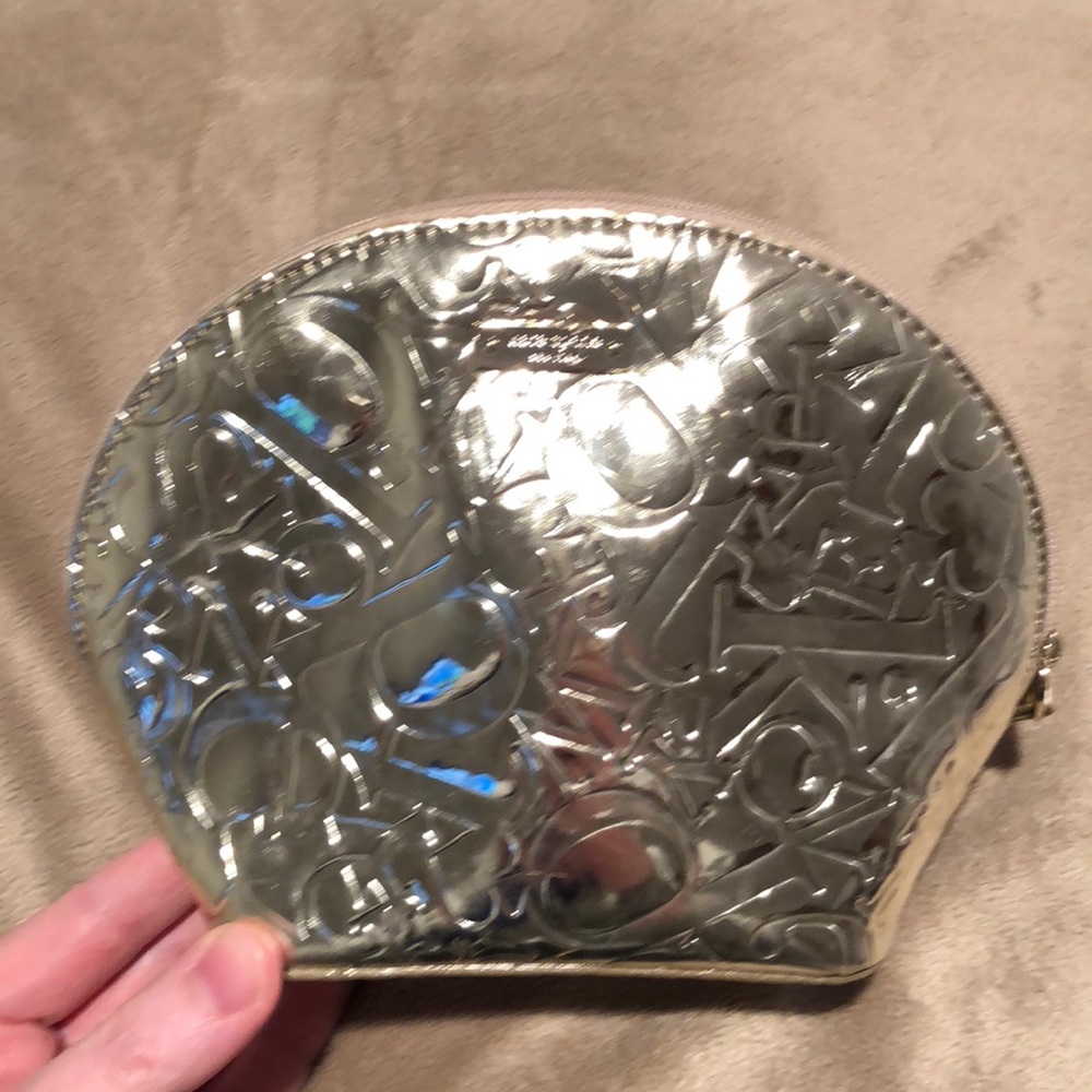 Kate Spade gold cosmetic bag